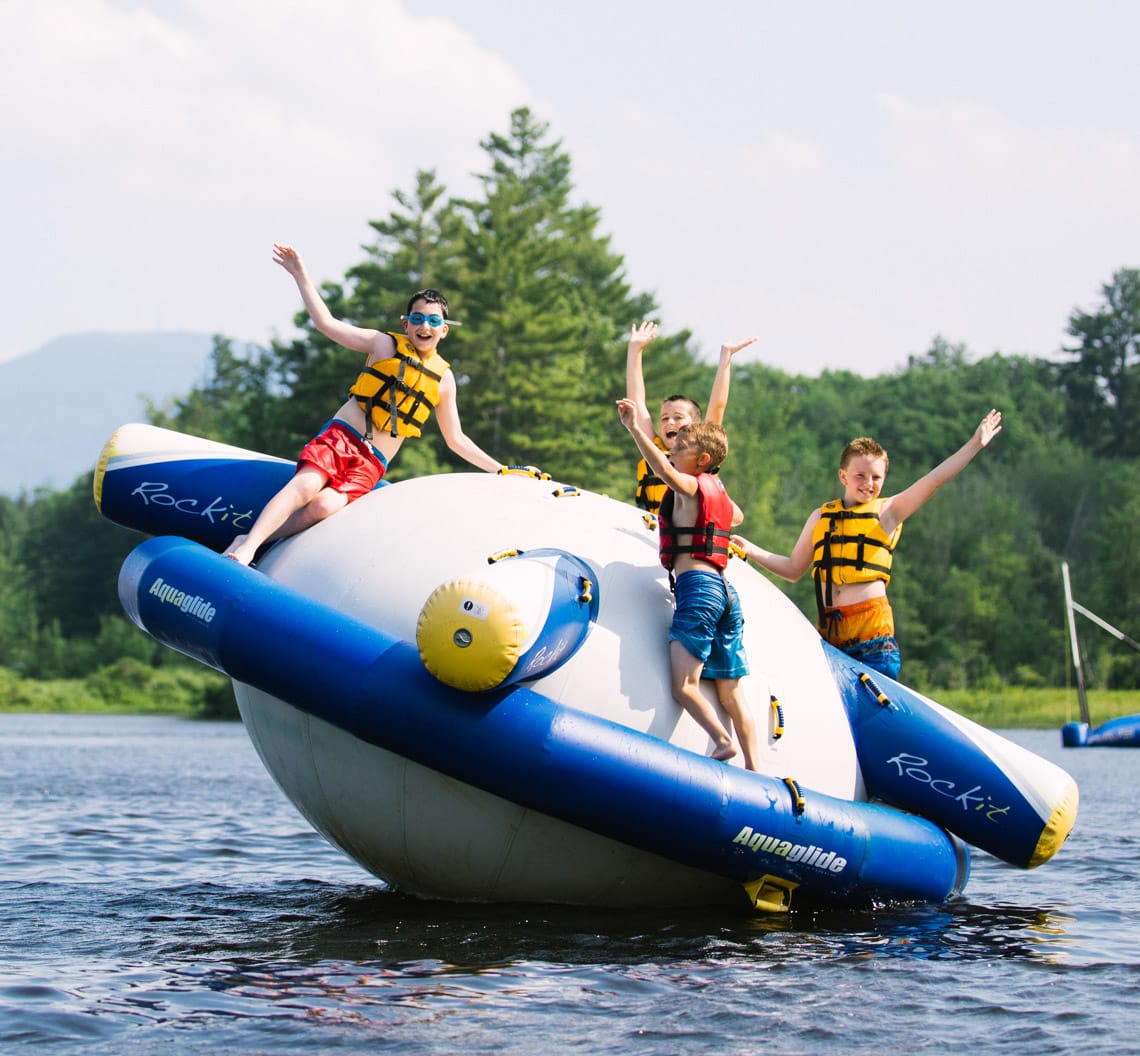 Boys on Aquaglide inflatable