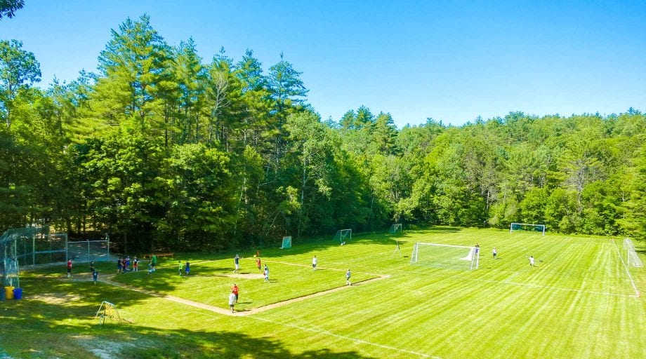 Soccer field with campers playing