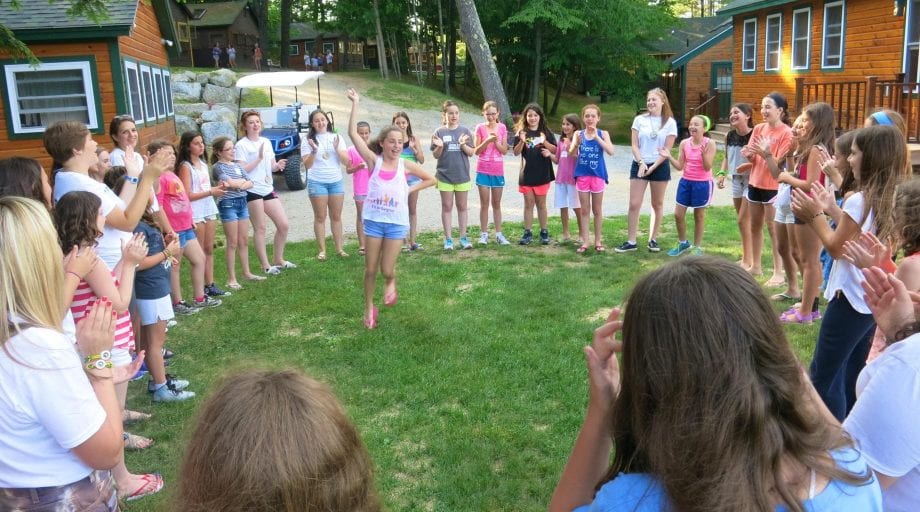 Dancing in a circle during the first day of camp