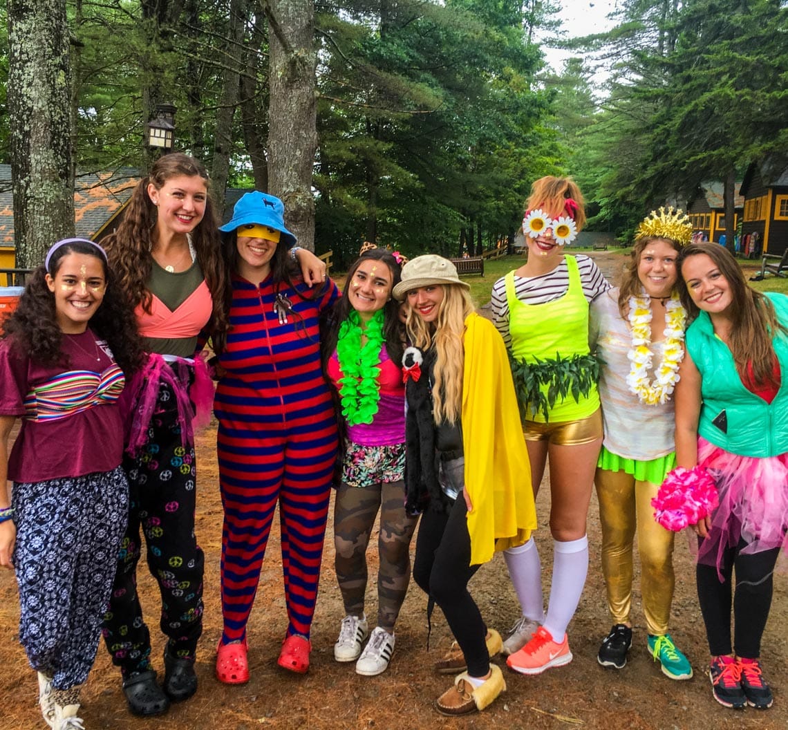 Campers in costume for special event smiling